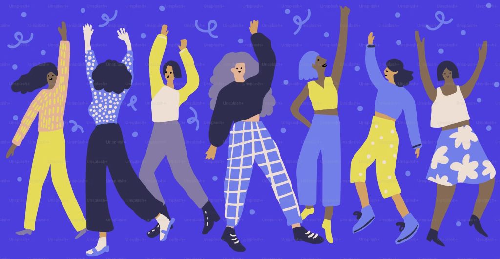 People dancing together at a wellness rave with music and movement