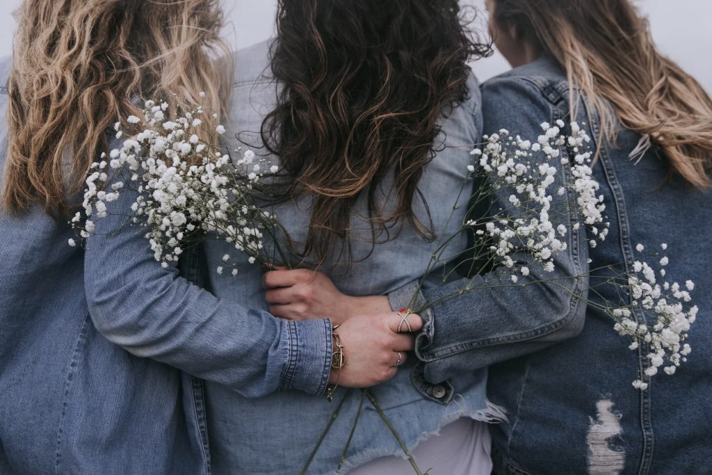 Midlife women supporting one another through challenges of menopause with self-care